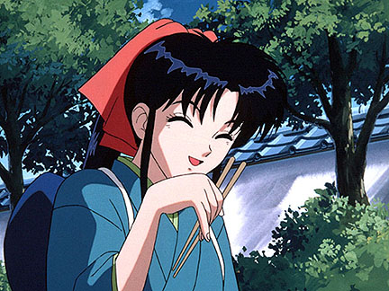 Kaori, tertawa sambil memegang sumpit..